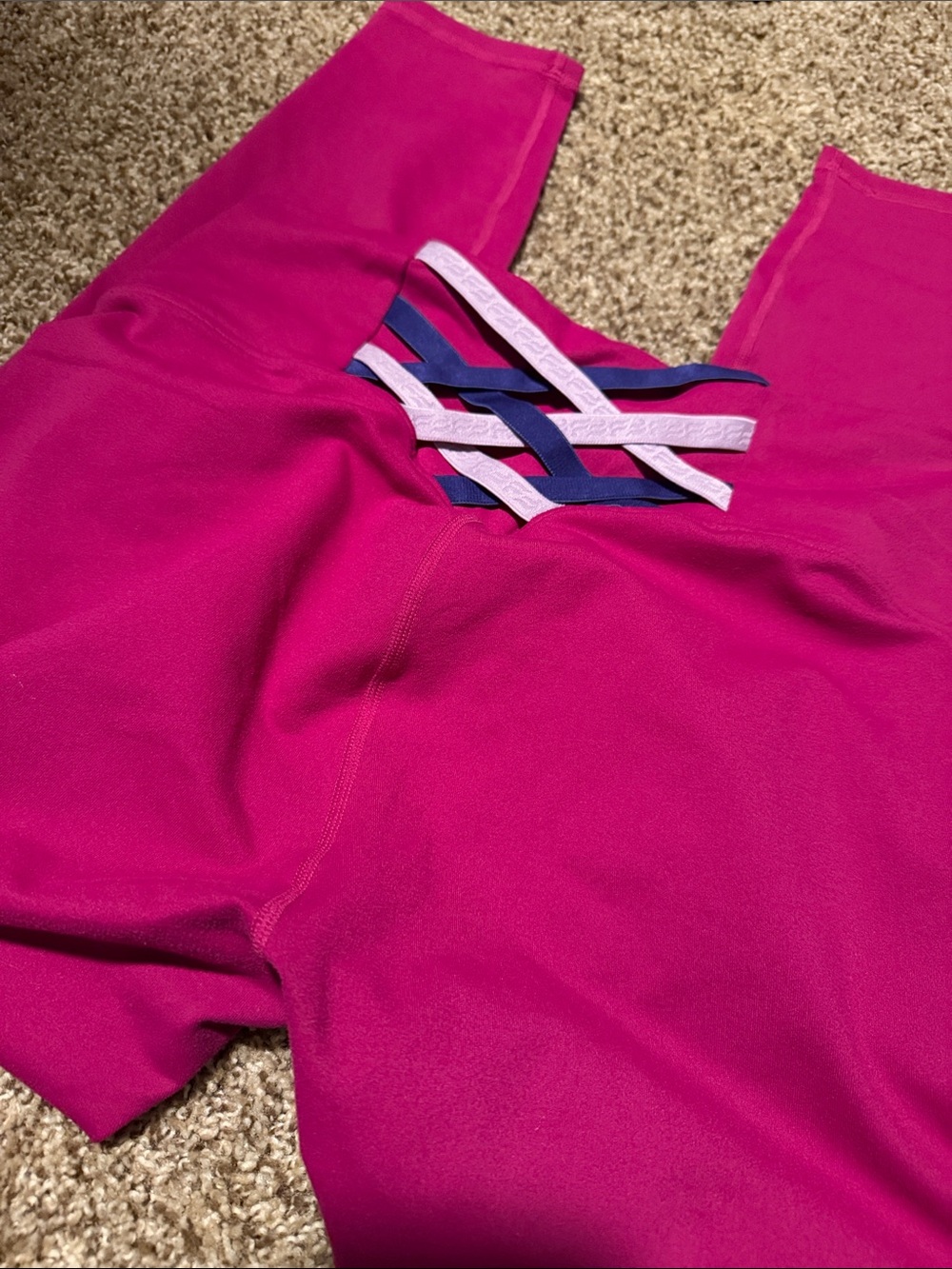 Fabletics Power Hold  fuschia leggings w/cross cross back accent (L) EUC!